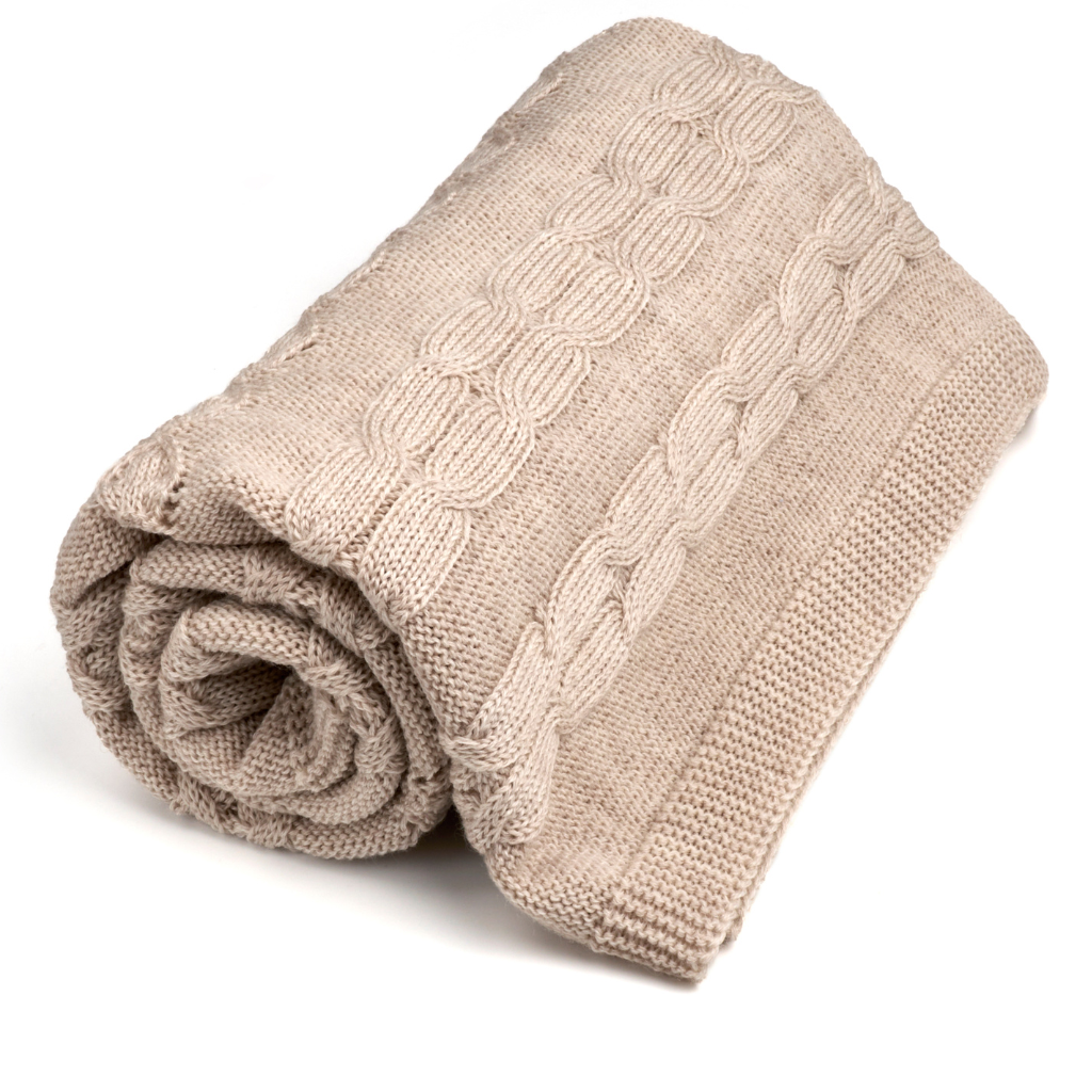 Merino Wool Cable Knit Baby Blanket beige color rolled up